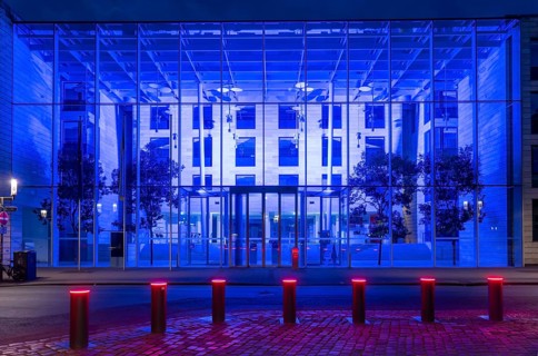 Historic old town, blue illuminated building of the Münster district government, illuminated
