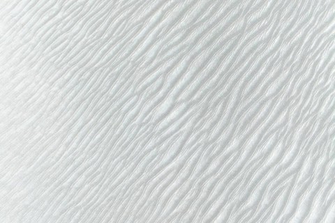 Intricate rippling sand patterns in La Puna desert create a captivating visual reminiscent of