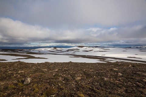 Snowfields at the Heidarvatn lake between Seydisfjördur and Eglisstadur in E Iceland