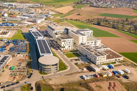 Extensive view of a hospital complex and surrounding landscape, hospital opening, Calw, Germany