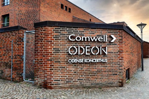 Entrance to the Comwell H.C. Andersen Hotel and Odeon Concert Hall, red brick building, façade with