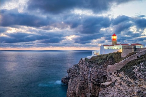 View of the Lighthouse of Cabo de Sao Vicente in Sagres, Algarve, Portugal, at evening with