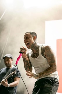 Singer Jason Aalon Butler from the US post-hardcore band Letlive on the Orbit Stage during the Rock