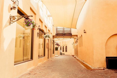 Doha, Qatar - 8th january, 2026: Narrow stone street Katara Cultural Village Doha. Traditional