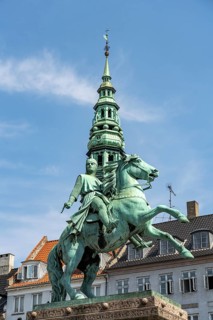 Equestrian statue of Absalon and the tower of St Nicholas Church on the central square Højbro Plads