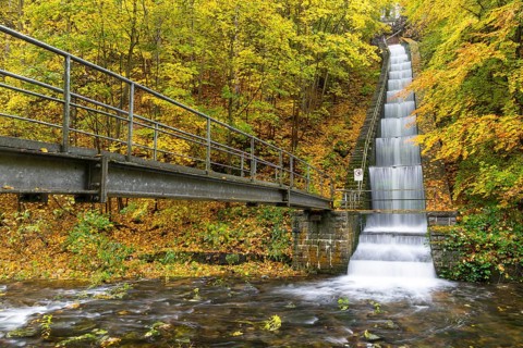 Cascade for power generation at the Rabenauer Grund hydroelectric power plant in autumn, Rote