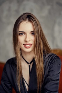 Closeup portrait of beautiful happy young woman