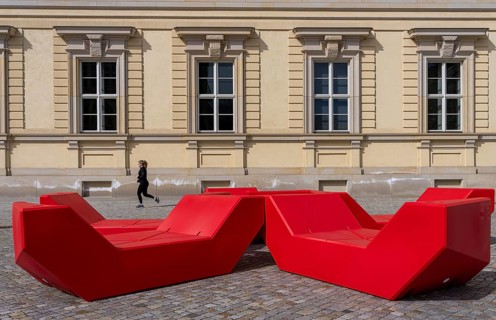 Red plastic seating elements, Humboldt Forum, Berlin, Germany