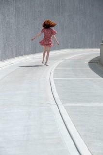 Portrait of a young woman, concrete desert, freedom, Emilia-Romagna, Italy