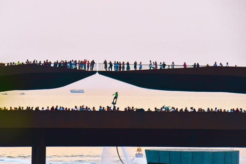 Phu quoc, Vietnam - 15th february, 2024: Crowd of spectators tourist on Kiss bridge during water