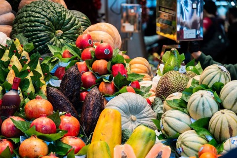 Fresh fruit and vegetables at a market stall at the Mercado de la Boqueria, the famous market on