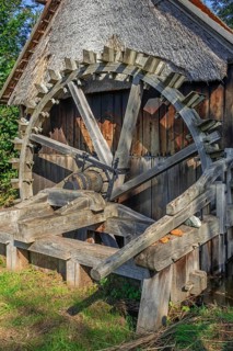 Wooden vertical-waterwheel of 18th century watermill, water wheel at open air museum Bokrijk,