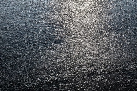 Frozen lake, structures of the water surface