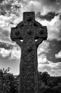 Weathered graves, tombstones, municipal cemetery, Celtic grave cross, Falmouth, Cornwall, black and