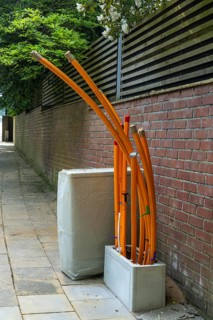 Distribution box in which empty conduits for fibre optic cables arrive and are connected, in which
