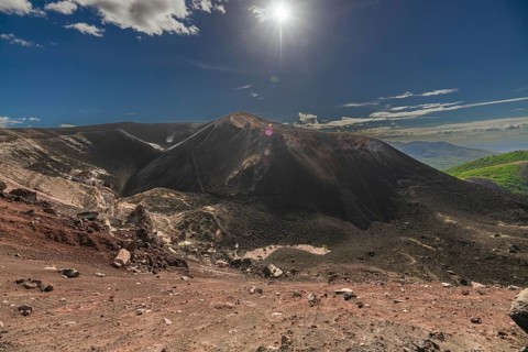 View of the Cerro Negro volcano surrounded by vegetation. Scenic view of Cerro Negro, Nicaragua