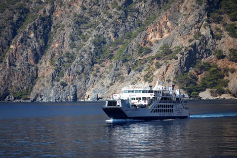 Ferry on the Libyan Sea with the Lefkia Ori or White Mountains in the background, Crete, Greece