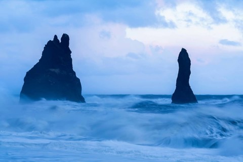 Reynisdrangar pinnacles, lava sandy beach, lava rocks, sea, waves, surf, blue hour, Vik, Iceland,