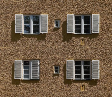 House wall with windows, borstei, heritage-protected residential development, Munich, Bavaria,