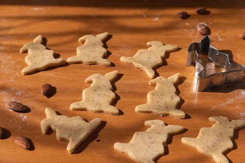 Cut out cookies in the shape of Easter bunnies