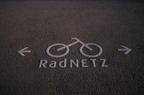 Pictogram, symbol, cycle path, cycle network, labelling, marking on asphalt, Stuttgart,