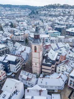 Snowy town view with dominating church tower in the background, Nagold, Black Forest, Germany