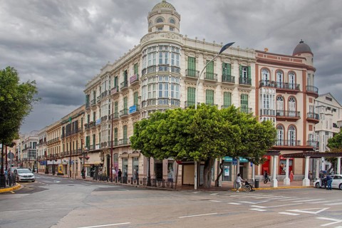 This Eclectic style building belongs to the expansion district in Spain square, historic centre of