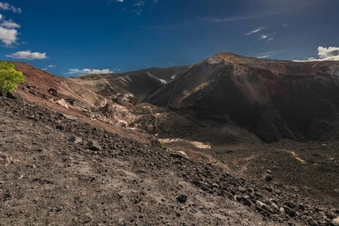 Landscape of the Cerro Negro volcano surrounded by volcanic rocks and sulfur. Beautiful view from
