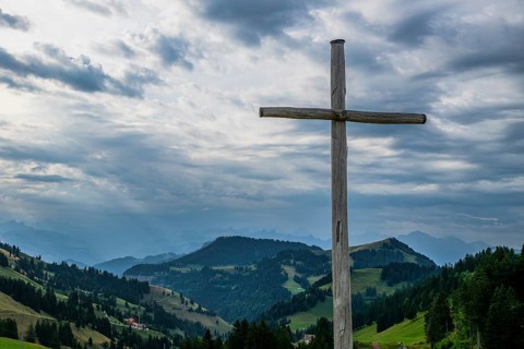 Wooden cross and storm clouds, Rigi Staffel, Arth, Switzerland