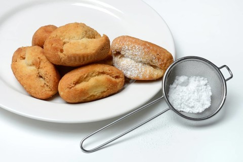 Schenkeli on a plate, sweet pastry for carnival time, Switzerland