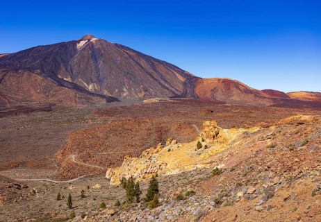 Mountain hiking on Montana Guajara, Canada del Capricho rock formation with view to Mount Teide,