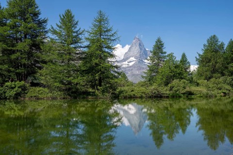 Matterhorn is reflected in Lake Grindji, Zermatt, Valais, Switzerland