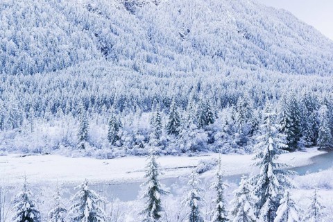 Isar valley in winter at temperatures of minus 18 degrees Celsius. Snow covered landscape with the