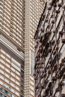 High contrast view of modern and aged architectural styles in Hong Kong, showcasing the diversity