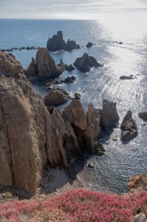 Rugged rocky coast, rocks in the sea, Arrecife de las Sirenas, Cabo de Gata-Nijar nature park Park,