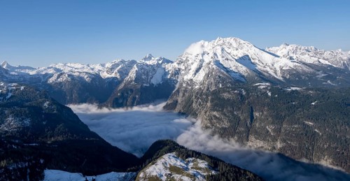 View of sea of clouds and snow-covered mountains, mountain panorama with Watzmann, from the Jenner,