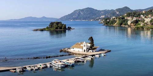 Vlacherna Monastery and Mouse Island in the Mediterranean from above Panorama on the island of