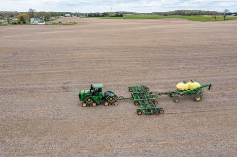 Grass Lake, Michigan - A farmer applies liquid fertilizer to a farm field in early spring. The war