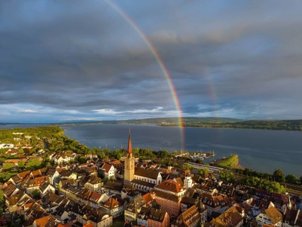 Aerial view of the historic old town of Radolfzell am Lake Constance with the cathedral illuminated