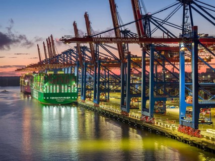 Aerial view at Waltershof harbour during the Blue Hour at Container Terminal Burchardkai (CTB) with
