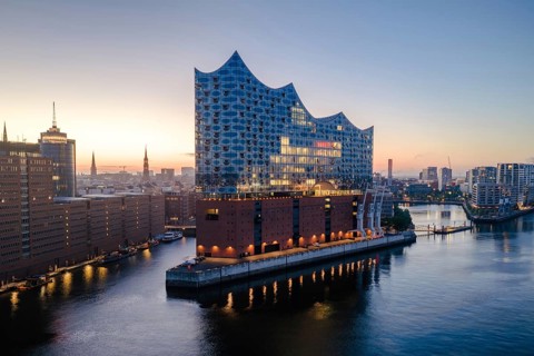 Aerial view of sunrise on the Elbe with Elbe Philharmonic Hall, Hamburg, Germany