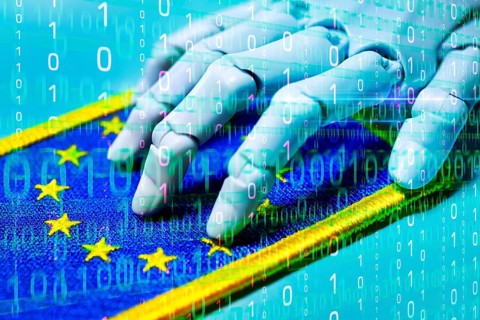 Robot hand on EU flag with binary code, AI laws and AI guidelines, photo montage +++ editorial use