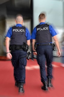 Wipe-clean image of policemen on patrol