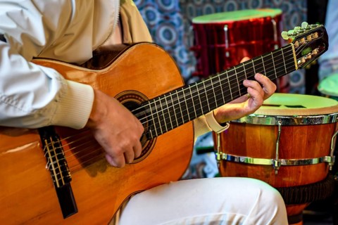 Acoustic guitar player in stage during brazilian popular music presentation Belo Horizonte, Minas