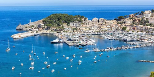 Port de Soller in Majorca from above seaside beach marina with boats panoramic trip in Spain