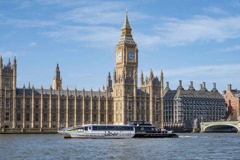 London, UK, March 17th 2026. An Uber River Taxi operated by Thames Clippers passes the Houses of