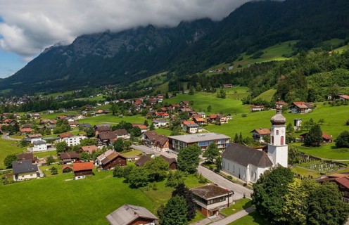Drone image, view of the village with parish church, Braz, Klostertal, Vorarlberg, Austria