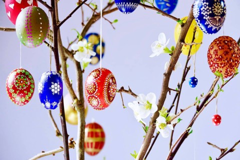 Easter, Easter bouquet with colorful Easter eggs, branches with flowers of an ornamental quince,