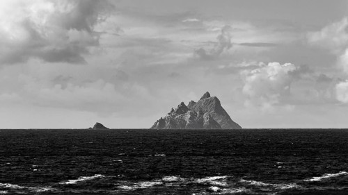 Bird island Little Skellig, rocky island on the horizon, monochrome, panoramic road Skellig Ring,