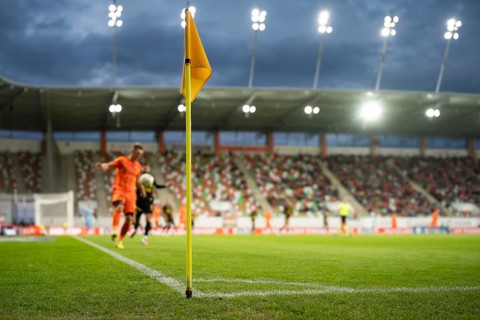 Corner of football pitch at the stadium during the match in Lubin, Poland